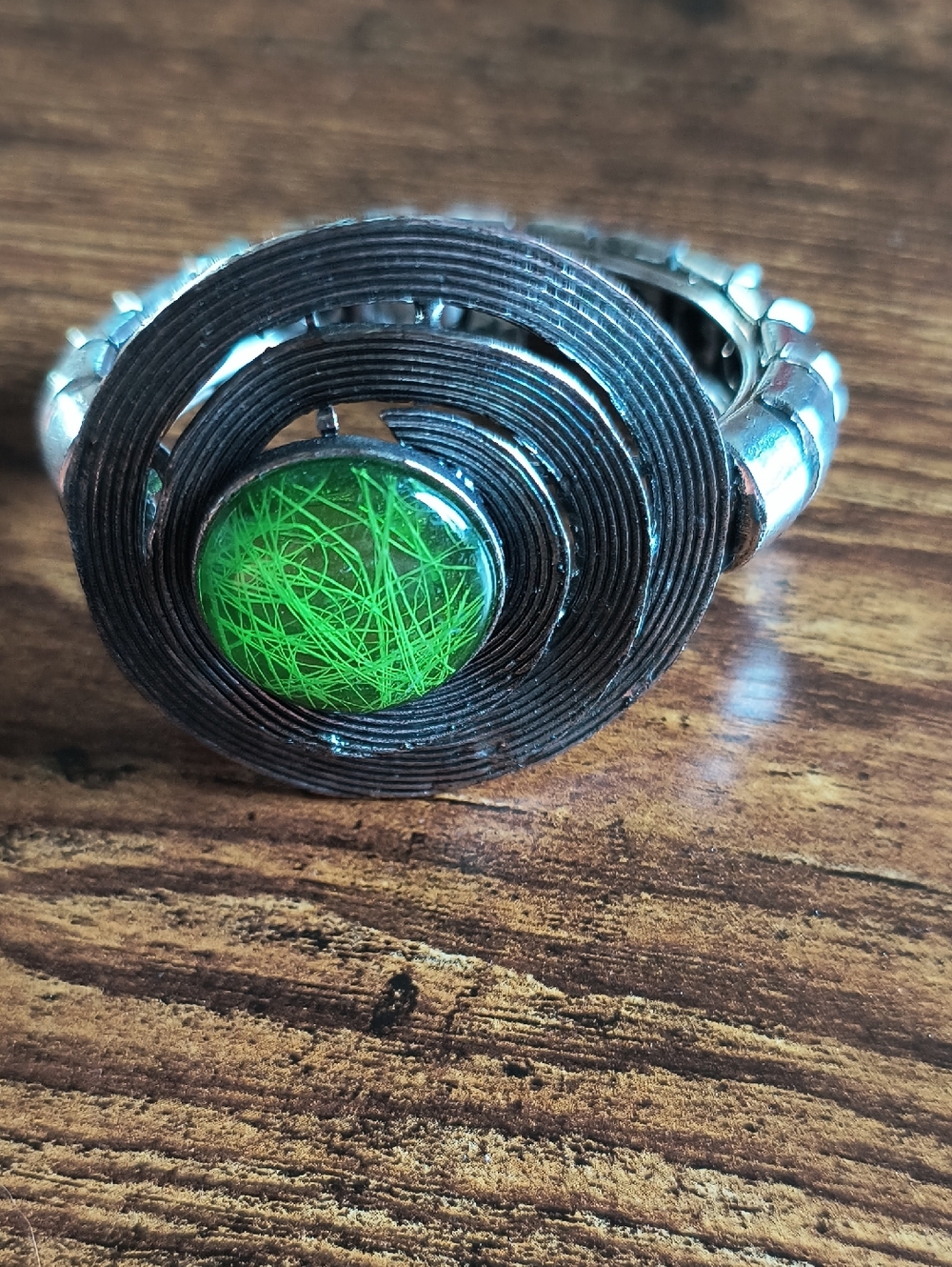 Spiral Metal Ring with Green Resin Center
